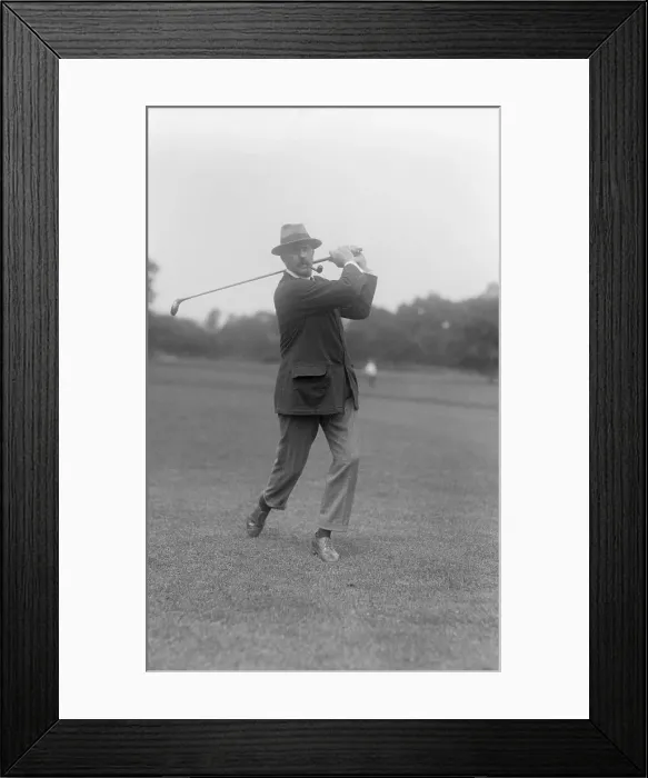 Framed Print : Edward Ray Poses Swinging Golf Club Framed Print : Edward Ray Poses Swinging Golf Club
