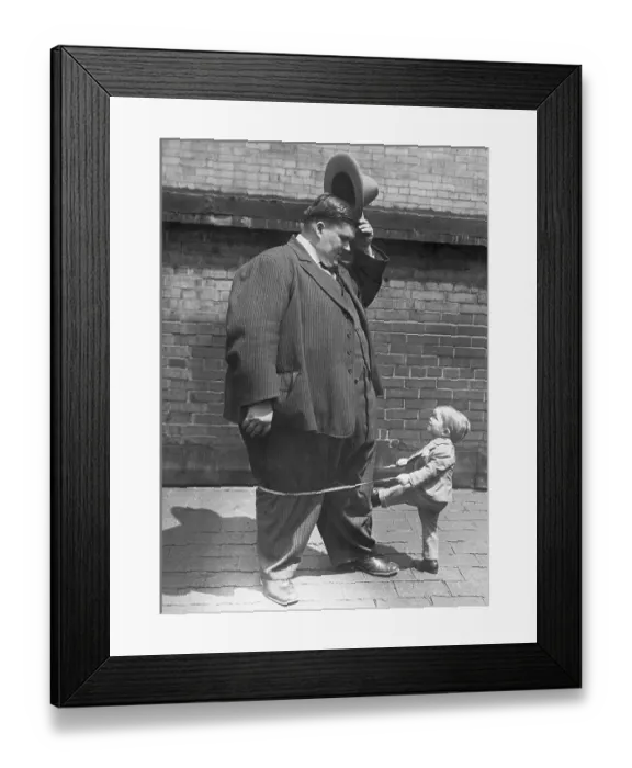 Framed Print : Largest and Smallest Men in World Framed Print : Largest and Smallest Men in World