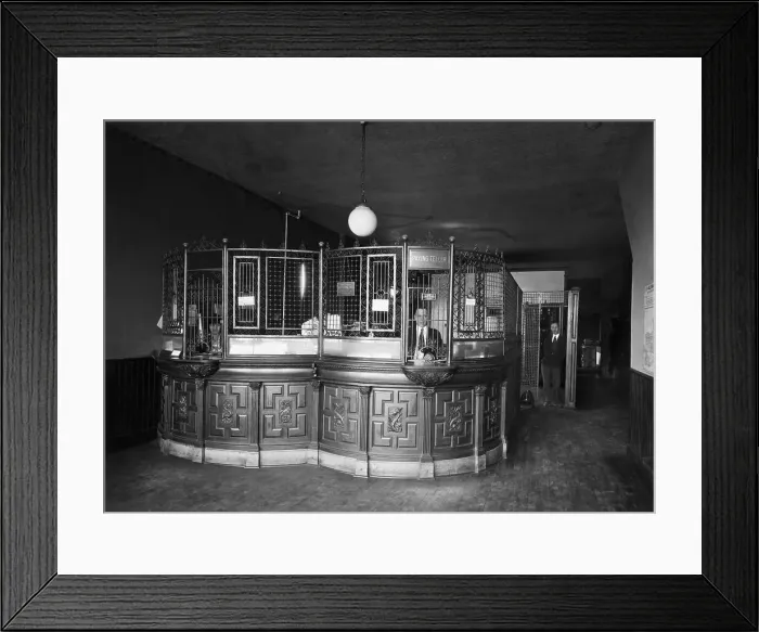 Framed Print : Bank Teller Cage with Typical Grillwork Framed Print : Bank Teller Cage with Typical Grillwork