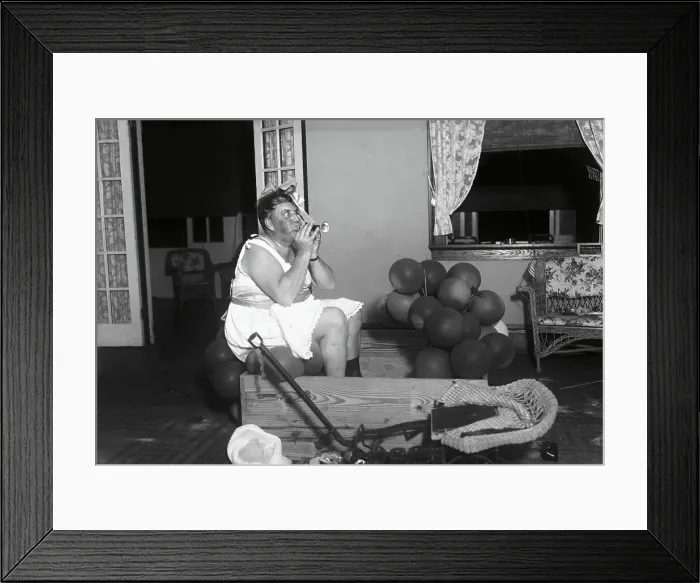 Framed Print : Addison Mizner Blowing Party Horn