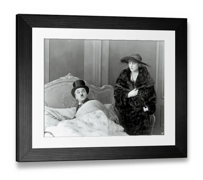 Framed Print : Charlie Chaplin and Edna Purviance in The Idle Class