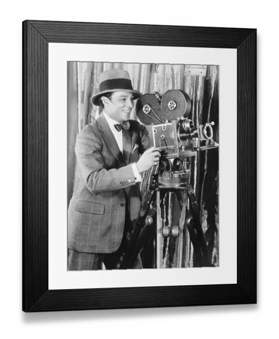 Framed Print : Rudolph Valentino Behind Movie Camera Framed Print : Rudolph Valentino Behind Movie Camera