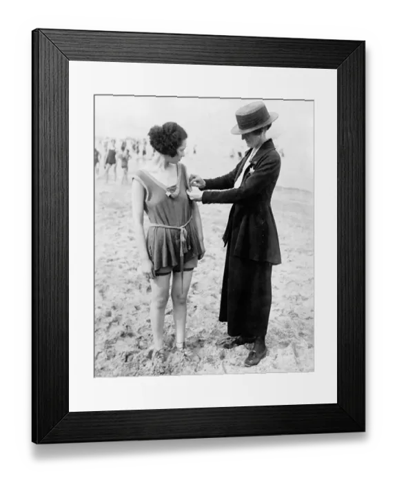 Framed Print : Policewomen Checking Length Violations Framed Print : Policewomen Checking Length Violations