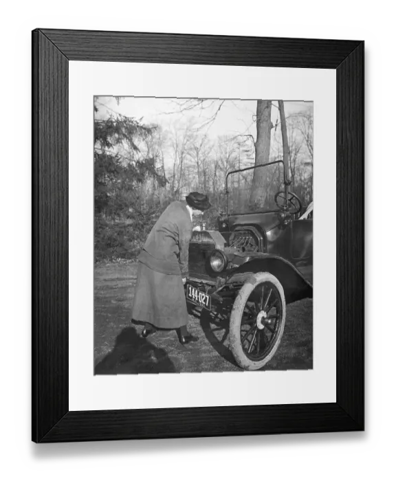 Framed Print : Lady Driver Cranking Her Car 1921 Framed Print : Lady Driver Cranking Her Car 1921