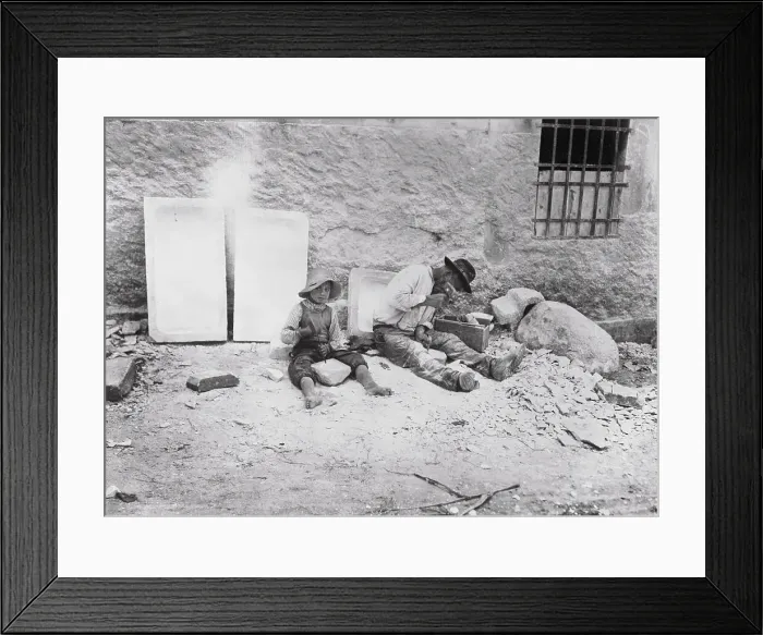 Framed Print : Man and Young Boy Sitting and Working With Minerals Framed Print : Man and Young Boy Sitting and Working With Minerals