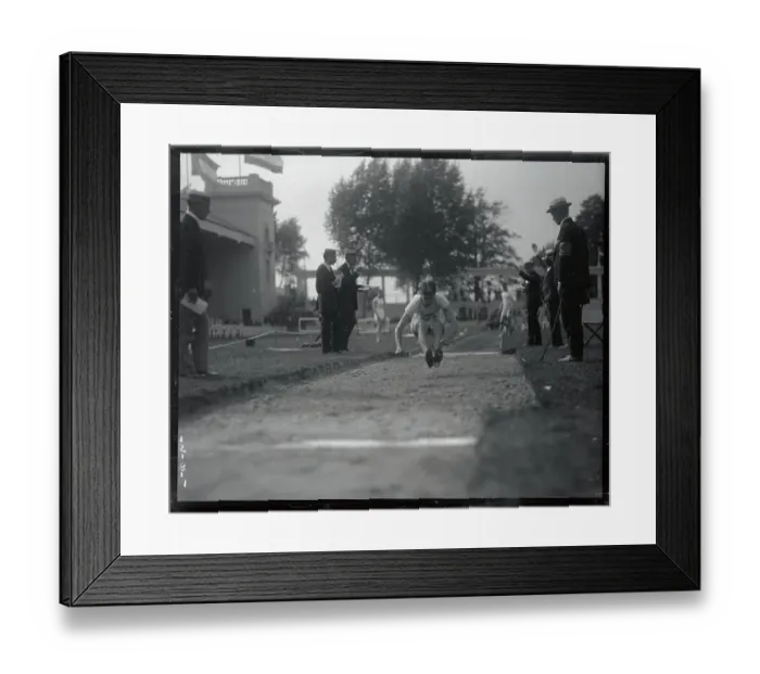 Framed Print : Carl Johnson Making His Jump in Olympic Games Framed Print : Carl Johnson Making His Jump in Olympic Games
