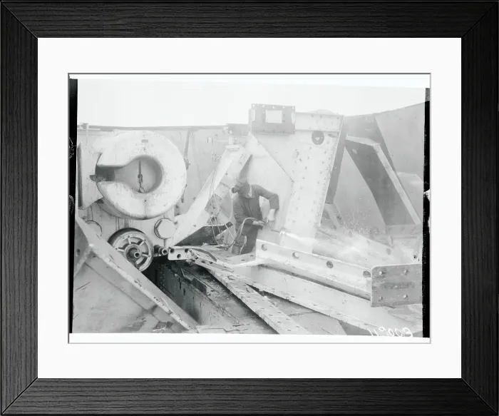 Framed Print : Worker Dismantling Heligoland Weaponry Structure Framed Print : Worker Dismantling Heligoland Weaponry Structure