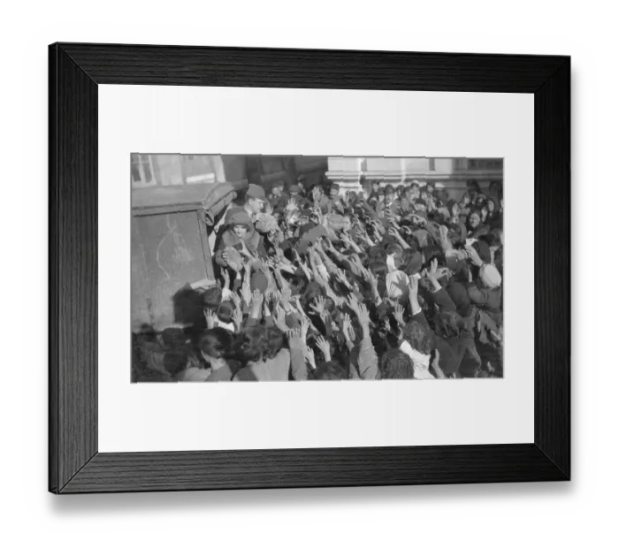 Framed Print : Man and Woman Distributing Bread Loaves