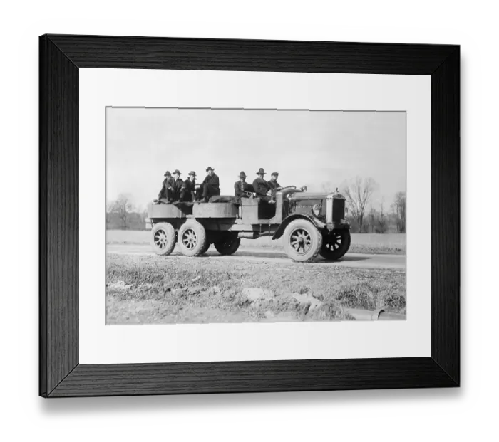 Framed Print : Men Giving Multiple Wheel Truck Road Test