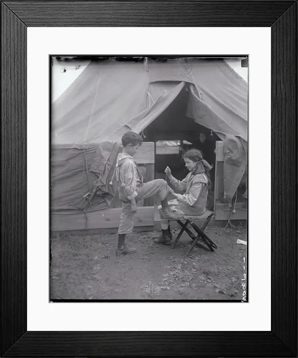 Framed Print : Girl Sewing Boys Pant Leg Framed Print : Girl Sewing Boys Pant Leg