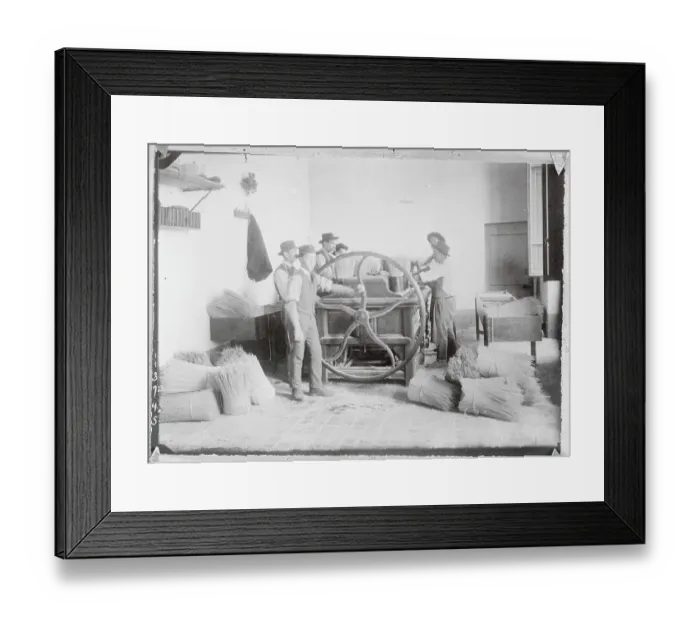 Framed Print : Hat Makers Operating Machinery to Process Straw Framed Print : Hat Makers Operating Machinery to Process Straw