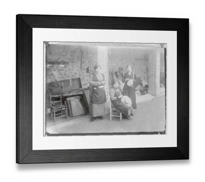Framed Print : Hat Makers Working Outside in Front of Building Framed Print : Hat Makers Working Outside in Front of Building
