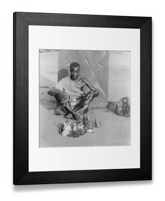 Framed Print : Medicine Man Sitting on Ground Framed Print : Medicine Man Sitting on Ground