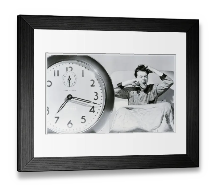 Framed Print : Man Waking Up To Alarm Clock Framed Print : Man Waking Up To Alarm Clock