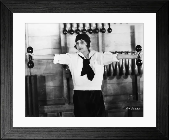 Framed Print : Woman Exercising with Dumbells Framed Print : Woman Exercising with Dumbells