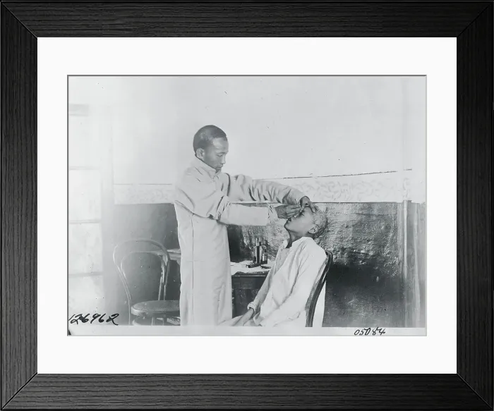 Framed Print : Street Oculist with a Patient Framed Print : Street Oculist with a Patient