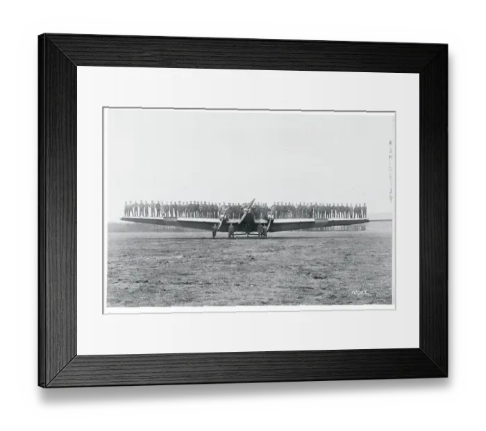 Framed Print : Men Testing a Plane's Wing Rigidity Framed Print : Men Testing a Plane's Wing Rigidity