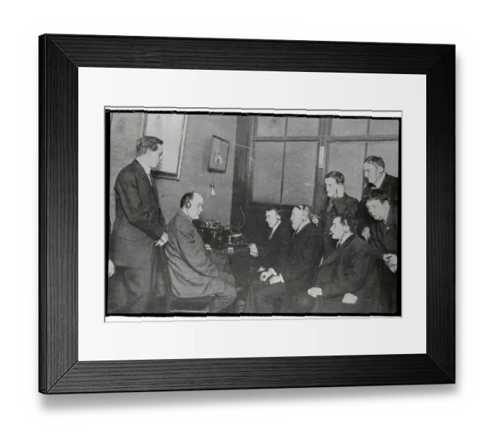 Framed Print : Men Listening to Radio with Earphones Framed Print : Men Listening to Radio with Earphones