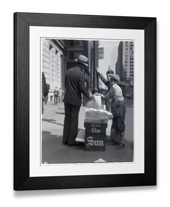 Framed Print : Boy Selling Newspapers on Sidewalk Framed Print : Boy Selling Newspapers on Sidewalk