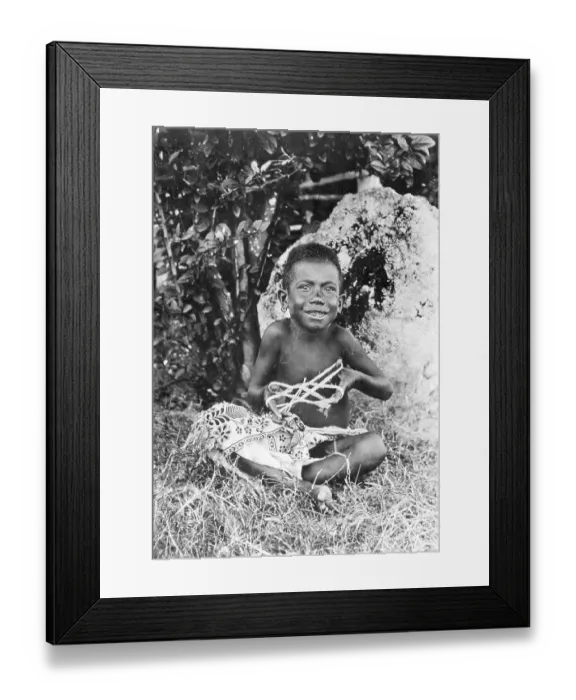 Framed Print : Young New Guinea Boy Playing with String Framed Print : Young New Guinea Boy Playing with String