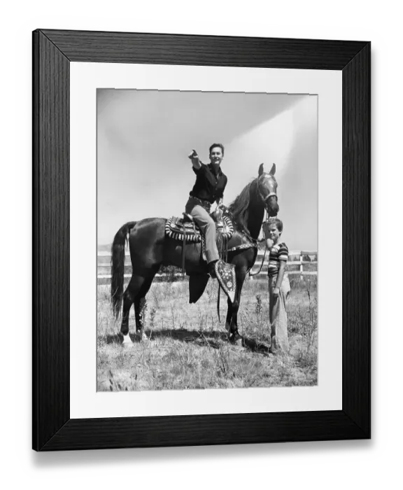 Framed Print : Actor Errol Flynn and Son While Horseback Riding Framed Print : Actor Errol Flynn and Son While Horseback Riding