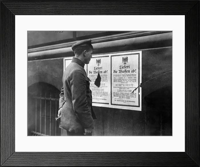 Framed Print : Policeman Reads Proclamation on Wall Framed Print : Policeman Reads Proclamation on Wall