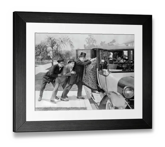 Framed Print : Men Pushing Stout Woman into Automobile Framed Print : Men Pushing Stout Woman into Automobile