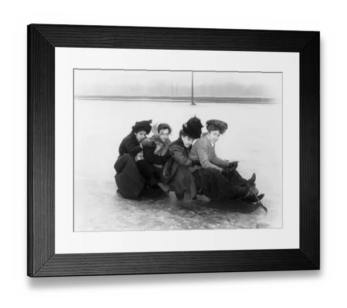Framed Print : Four Women Seated On a Toboggan Framed Print : Four Women Seated On a Toboggan