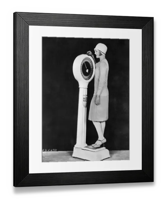 Framed Print : Flapper Weighing Herself on Scale Framed Print : Flapper Weighing Herself on Scale