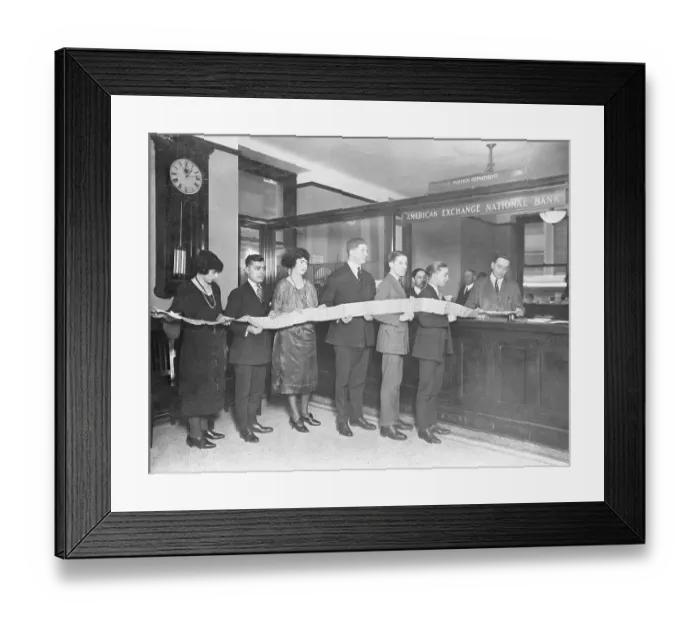 Framed Print : Bank Employees Holding Long Draft Tape Framed Print : Bank Employees Holding Long Draft Tape