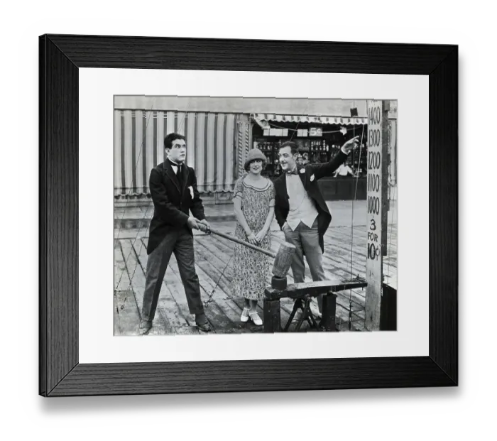 Framed Print : Man Testing Strength at Beach Movie Still Framed Print : Man Testing Strength at Beach Movie Still