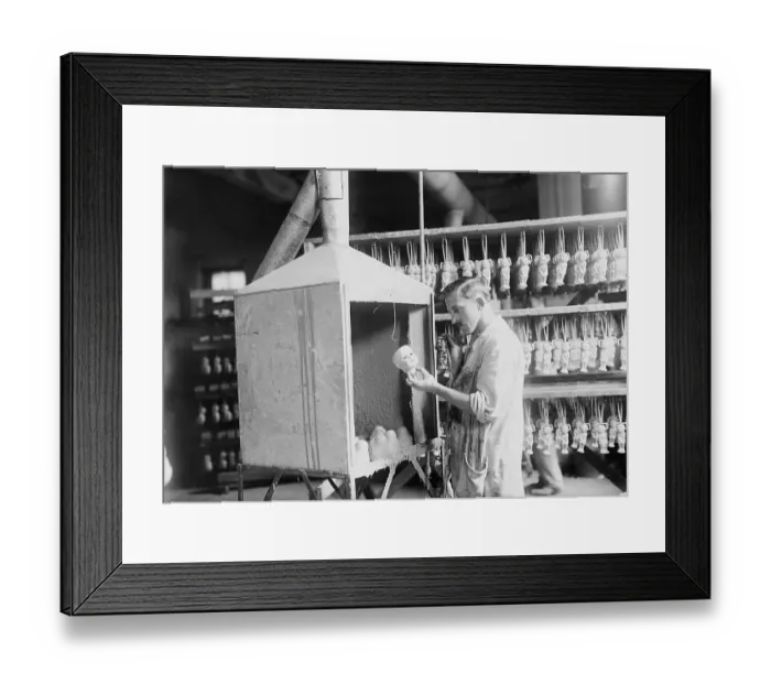 Framed Print : Man Working in Doll Factory Framed Print : Man Working in Doll Factory