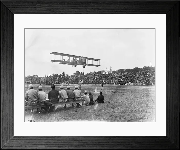 Framed Print : Plane Flying Over Stadium Framed Print : Plane Flying Over Stadium
