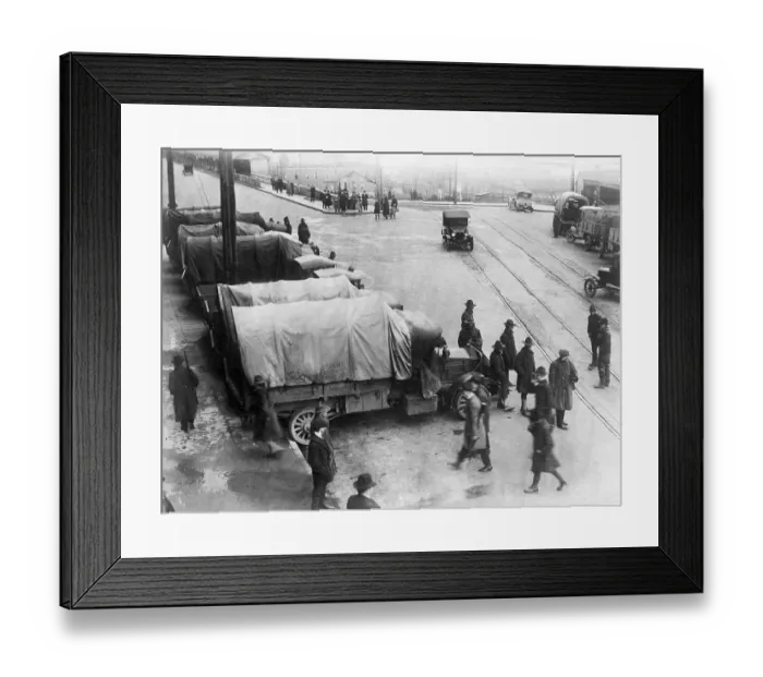 Framed Print : Striking Workers Walk by Covered Trucks Framed Print : Striking Workers Walk by Covered Trucks