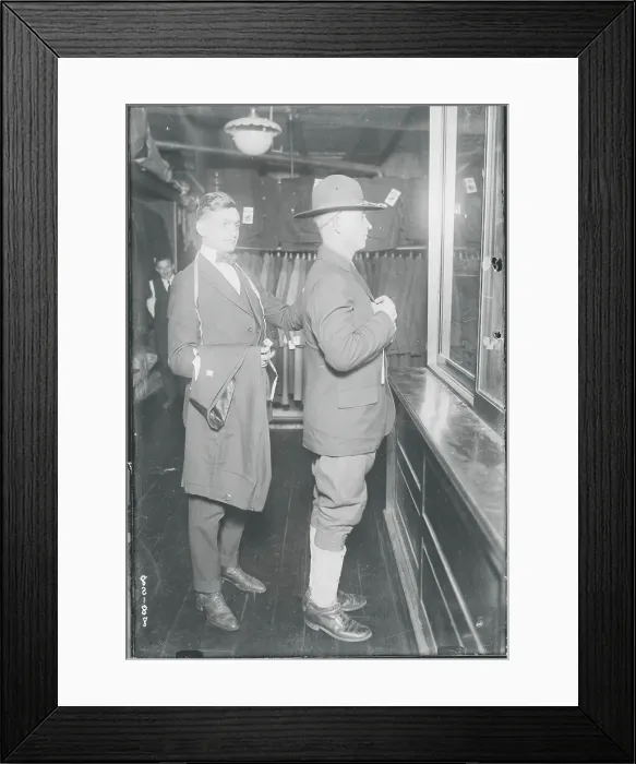 Framed Print : Soldier Trying on Jacket Framed Print : Soldier Trying on Jacket