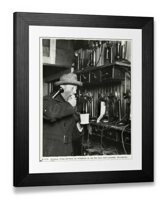 Framed Print : Man Using Old-Fashioned Telephone Framed Print : Man Using Old-Fashioned Telephone