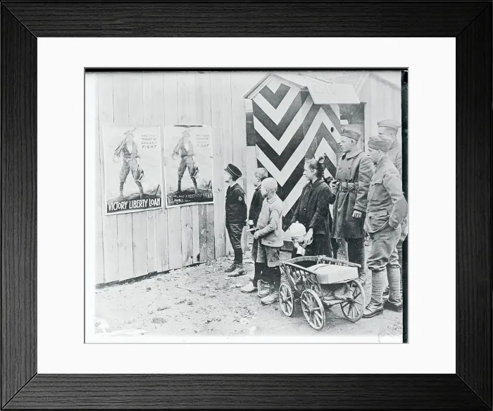 Framed Print : Young Children and Soldier Reading American Military Advertisement Framed Print : Young Children and Soldier Reading American Military Advertisement