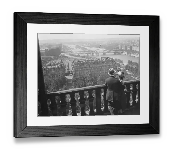 Framed Print : Couple Looking at Paris From the Eiffel Tower Framed Print : Couple Looking at Paris From the Eiffel Tower