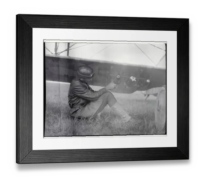 Framed Print : American Pilot Attaching Bombs to Plane Framed Print : American Pilot Attaching Bombs to Plane