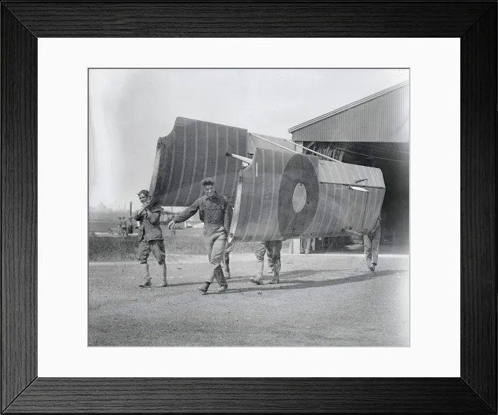 Framed Print : Soldiers Carry Aircraft Wings Framed Print : Soldiers Carry Aircraft Wings