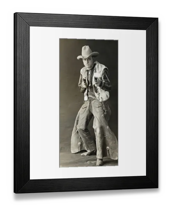 Framed Print : Actor Roy Stewart in Cowboy Attire Holding Revolvers Framed Print : Actor Roy Stewart in Cowboy Attire Holding Revolvers