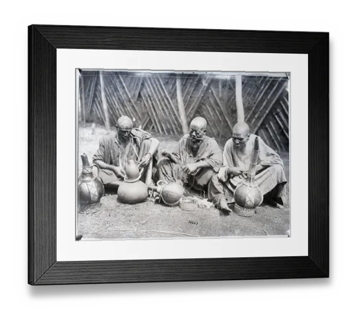 Framed Print : Africans Seated Ornamenting Pottery Framed Print : Africans Seated Ornamenting Pottery