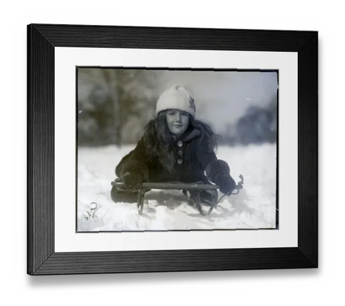Framed Print : Girl Sledding In Central Park Framed Print : Girl Sledding In Central Park