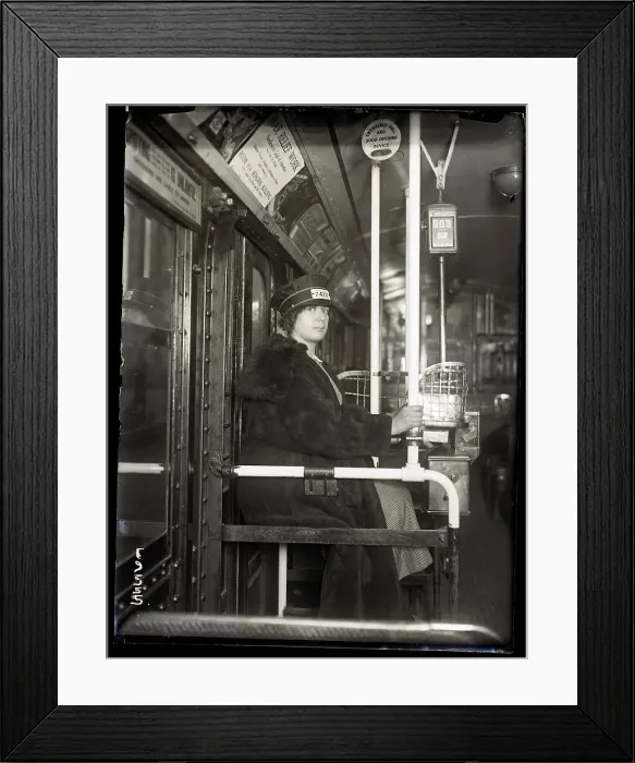 Framed Print : Female Streetcar Conductor Seated Framed Print : Female Streetcar Conductor Seated