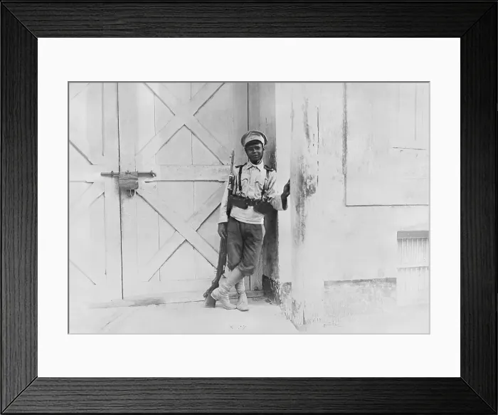 Framed Print : Military Guard Leaning Against Door Frame Framed Print : Military Guard Leaning Against Door Frame