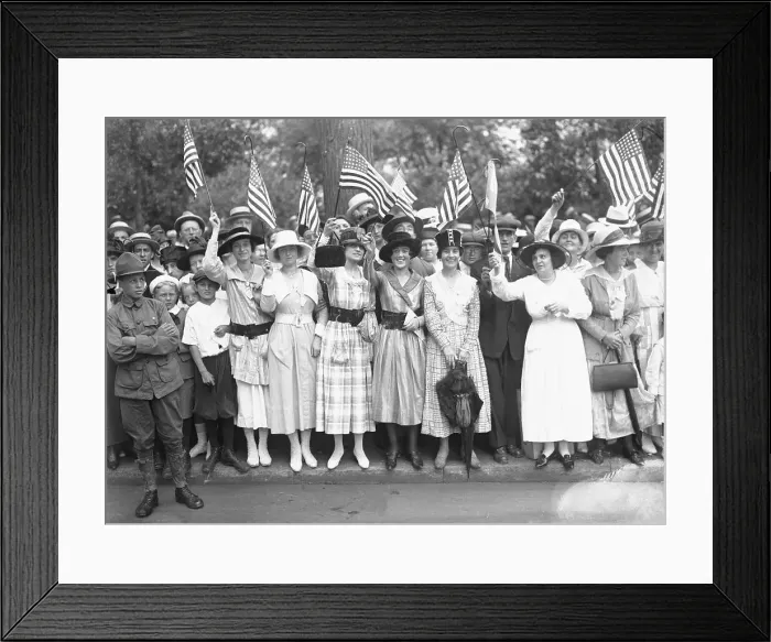 Framed Print : Rally Goers Waving Flags While Posing for Camera