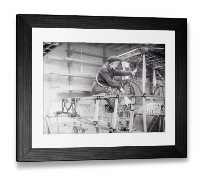 Framed Print : Woman Working on Airplane Framed Print : Woman Working on Airplane
