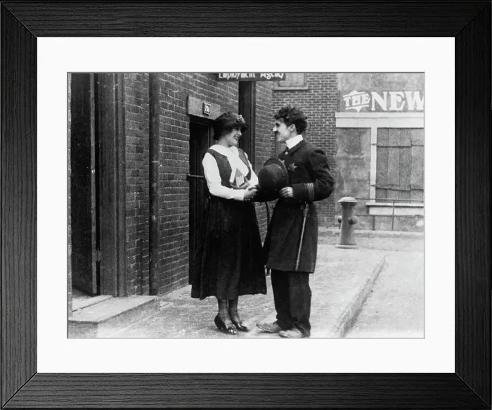Framed Print : Charlie Chaplin in Police Uniform Framed Print : Charlie Chaplin in Police Uniform