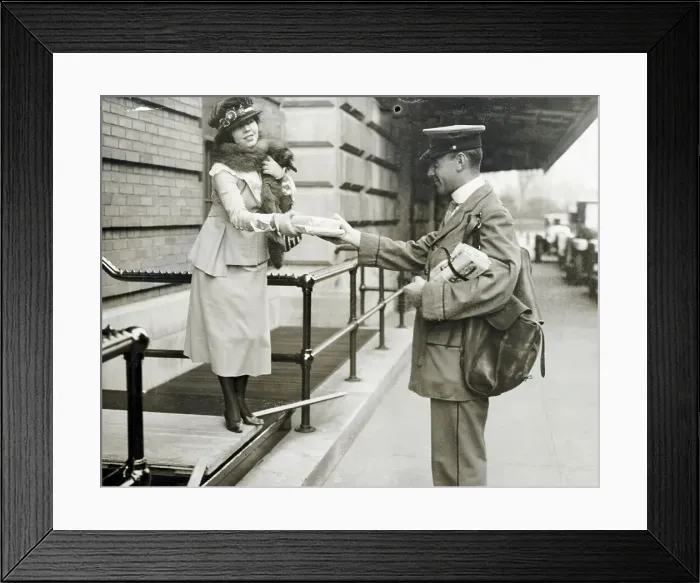 Framed Print : Mailman Delivering Packages to Woman Framed Print : Mailman Delivering Packages to Woman