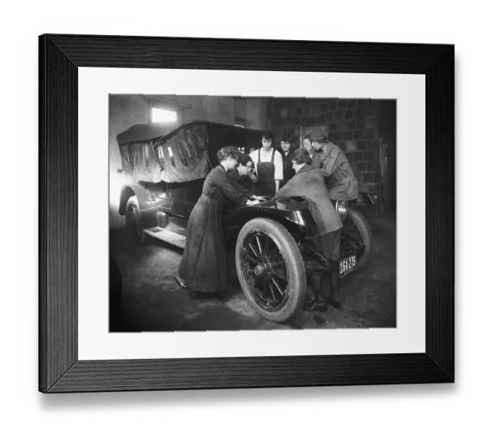 Framed Print : Women Receive Instruction Working On Car Framed Print : Women Receive Instruction Working On Car